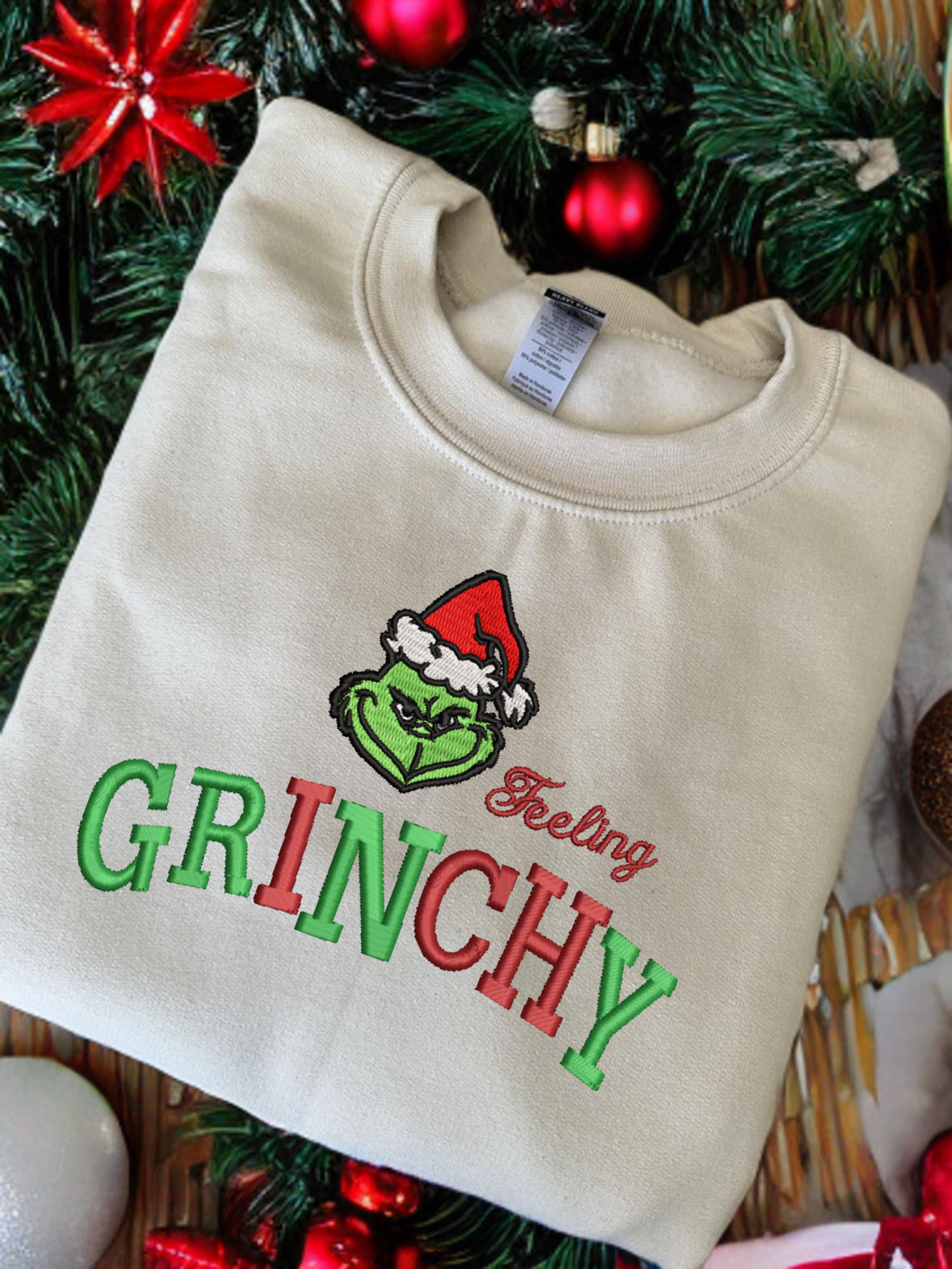 Sweat brodé Grinch noel